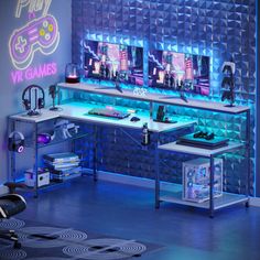 a gaming room with neon lights and video game controllers on the wall behind the desk