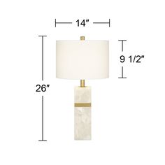 a table lamp with measurements for the base