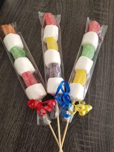 candy lollipops are arranged in cellophane bags