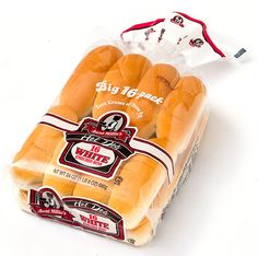 a package of hotdogs sitting on top of a white table