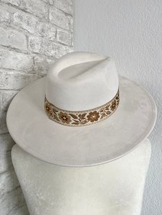 We love this hat, perfect white hat with a matching ivory+neutral flower woven band! It has a drawstring on the inside if you need to adjust it and make it a little smaller. The fabric material is a soft faux suede that is on the stiffer side! The width of the brim on the hat itself is 3.5" wide. The circumference of the inside of the hat is 22.5” but is adjustable with the drawstring interior and you can make it smaller. Fabric is 100% Polyester. Hand wash only. Bride Headband, Flower Band, Headband Tiara, Jewelry Candles, White Hat, Backpack Tote Bag, Dress Jewelry, Wide Brimmed Hats, Brim Hat