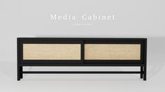 the media cabinet is made from black wood and has two beige panels on each side