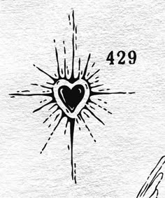 an ink drawing of a heart with rays coming out of it and the number twenty nine