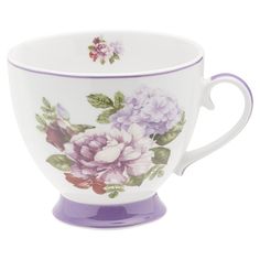 a purple and white coffee cup with flowers on it