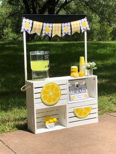 an outdoor lemonade stand on the sidewalk