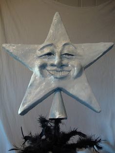 a white star with a smiling face on it