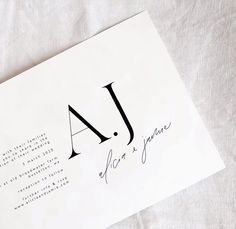 an envelope with the letters a and j on it