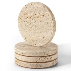 three round coasters stacked on top of each other