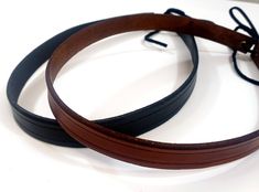 These simple leather crowns work great as either a basic circlet or as a hat band. Eyelets in the back allow for easy size adjustment. Bands measure 1/2 inch wide and are available in multiple colors. The circlet measures 20 inches when laid flat, and laces closed through eyelets on the back to adjust to fit your head. Additional styles of crowns and cuffs are also available - take a look at my additional available items! Your leather crown will be shipped first class within three weeks. Fantasy Barbarian, Winter Cloak, Leather Crown, Simple Leather, Costume Hats, Red Cedar, Hat Band, Medieval Fantasy, Multiple Color