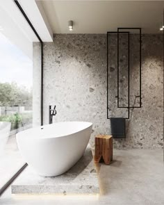 an instagramted photo of a bathroom with a large bathtub in the middle