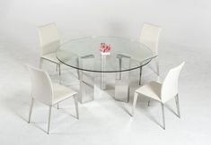 a glass table with four chairs around it