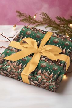 two wrapped presents sitting on top of a table