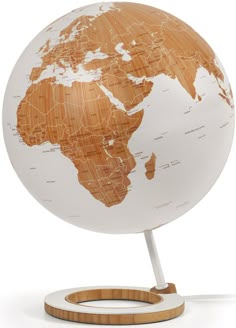 a wooden and white globe on a stand with an electric cord plugged into it