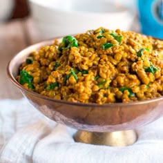 a close up of a bowl of food on a table