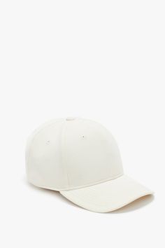 A refined take on athleisure wear, this Logo Cap in elegant Antique White is crafted from luxurious wool crepe. It has a discreet red embroidered VB logo at the back and VB printed logo tape on the interior and an adjustable plastic snap at the back for absolute comfort. Victoria Beckham Logo Cap In Antique White  - Size ONE SIZE UK Wool Crepe, Athleisure Wear, Antique White, Print Logo, Victoria Beckham, Athleisure, Wool, ? Logo, Red