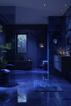 a bathroom with blue lighting and a plant in the corner on the floor next to the bathtub