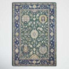 an area rug with blue and green colors