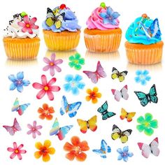 colorful cupcakes with butterflies and flowers on them