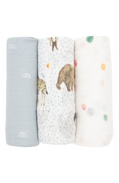 three baby swaddles with animals on them