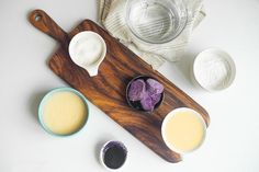 ingredients for making homemade ice cream sitting on a cutting board