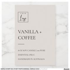 the vanilla and coffee label is displayed on a white marble surface with black lettering that reads,