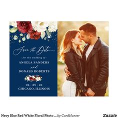 an elegant photo save the date card with red flowers and greenery on white paper