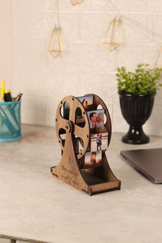 an old movie projector sitting on top of a table