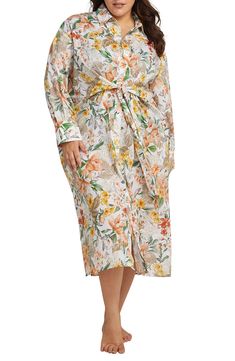 A floral print puts you in a vacation state of mind in this breathable cotton cover-up dress finished with a tie waist and curved hem. Spread collar Long sleeves with button cuffs 100% cotton Hand wash, line dry Imported Spring Long Sleeve Cotton Beach Dress, Spring Beach Sundress For Loungewear, Spring Cotton Beach Dress Cover-up, Floral Print Beach Dress For Vacation Brunch, Spring Brunch Beach Dress With Tropical Print, Spring Daywear Sundress For The Beach, Spring Sundress For Daywear At The Beach, Spring Loungewear Dress With Tie Waist, Beachwear Dresses With Tie Waist For Daywear