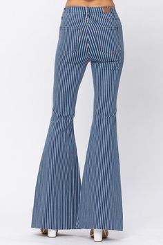 High waisted super flare pinstripe jeans. button front/pockets Trendy Pinstripe Wide Leg Bottoms, Trendy High Waist Pinstripe Bottoms, Spring Dark Wash Cotton Flares, Striped Cotton Jeans With Pockets, Trendy Cotton Jeans With Vertical Stripes, Denim Wide Leg Bottoms With Vertical Stripes, Striped Denim Jeans With Pockets, Wide Leg Denim Bottoms With Vertical Stripes, Striped Wide Leg Denim Jeans