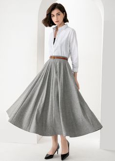 Classic Pleated Gray Skirt, Classic Lined Maxi Skirt For Spring, Classic Spring Lined Maxi Skirt, Classic Spring Maxi Skirt With Lining, Gray Relaxed Fit Lined Maxi Skirt, Gray Flared Maxi Skirt With Lined Skirt, Gray Flared Maxi Skirt With Lining, Gray Relaxed Maxi Skirt With Lined Skirt, Gray Relaxed Maxi Skirt With Lining