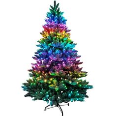 a multicolored christmas tree with lights on it's base and a white background