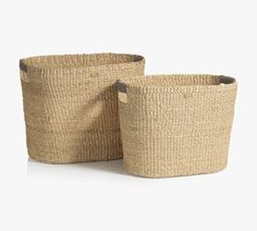 two large baskets with handles on each side