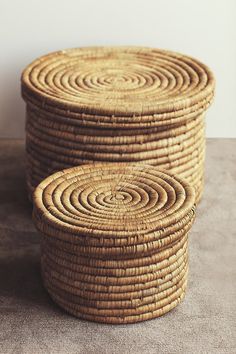 three woven baskets stacked on top of each other