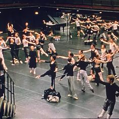 a group of people standing on top of a stage