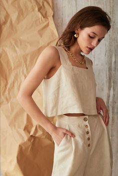 "Beige Linen Crop Top, Square Neckline Top, Cropped linen shirt, loose linen top, linen crop top, linen tank top, linen top, linen sleeveless top, linen basics, linen tops for women, soft linen, flax clothing, women linen clothing MORE: https://www.etsy.com/shop/SaikoEcoStore?ref=seller-platform-mcnav DETAILS - Cropped length - Square Neckline - Sleeveless design - 100% lightweight European linen fabric - Cut and sewn to order just for you in our studio COLOR - Beige SIZING & FIT - True to s Cropped Linen Shirt, Square Neckline Top, Linen Art, Flax Clothing, Linen Sleeveless Top, Spring Summer Capsule Wardrobe, Natural Linen Dress, Linen Shirts Women, Linen Crop Top