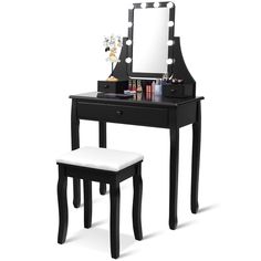 a vanity table with a stool and mirror