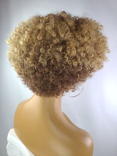 Our natural texture 8 Inch Tapered Afro Kinky Curly Wig with Afro Hairline will definitely have all eyes on you. This wig mimics human hair with it's low luster and soft texture. Everyone will believe it's your natural hairline with our realistic ear to ear afro hair. Numerous styling options are available. Made with premium heat resistant synthetic fiber on a machine made elastic cap. Available in colors 4/27 and salt & pepper. Fits small to medium size crowns. It's sure to become your go-t Curly Bobs For Round Faces, Coily Hairstyles, Tapered Afro, Wigs Collection, Black Hair Short Cuts, Curly Fro, Shaved Side Hairstyles, Crochet Wig, Curly Crochet Hair Styles