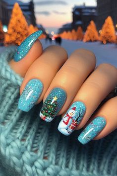 Get festive with these Simple Christmas Nail ideas! Featuring Christmas Nails Blue Short adorned with snowflakes and sparkly accents, these Short Christmas Nail Designs Blue are perfect for the season. Try December Nails Blue And Silver for a chic winter look. Embrace Winter Nails Acrylic Blue for a stylish vibe this holiday! #Tailwind24 Winter Nails Acrylic Blue, Short Christmas Nails Blue, Christmas Nail Designs Blue, Nails Blue Short, December Nails Blue, Girly Christmas Nails, Pastel Christmas Nails, Simple Christmas Nail Ideas