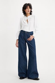 Levi's Baggy Dad Wide Leg Jeans Let's Get Lost Again The kind of jeans you might steal from your parent's closet—but baggier. With a mid rise, wide-leg cut and straight leg, the Baggy Dad Wide-Leg jeans are relaxed yet flattering with extra room for a subtle edge.  - A fit inspired by the way dads rock their jeans—but baggier  - Featured in a mid rise with a wide leg  - Roomy and slouchy through the hip and thigh  - High rise: 10 5/8"  - Wide leg  - 100% cotton  - Denim  - Non-stretch  - Zip fly  - 5-pocket styling Baggy Jeans For Women, Let's Get Lost, Workwear Overalls, Levis Outfit, Best Jeans For Women, Lets Get Lost, Jean Boyfriend, Loose Jeans, Levis Women