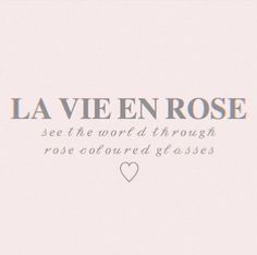 the words la vie en rose are written in silver on a white background with a heart