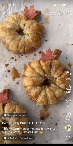 two croissants with autumn leaves on them