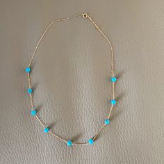 Ras Du Cou Gold Necklace With Turquoise Blue Stones. 18- Karat Gold. Imported Blue Stones, Blue Stone, Turquoise Blue, Blue Gold, Womens Jewelry Necklace, Stone Color, Chain Necklace, Gold Necklace, Color Blue