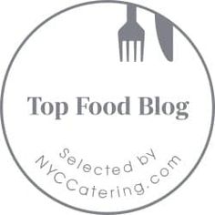 the top food blog logo with fork and knife in circle on white background for catering