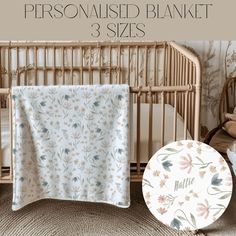 a baby crib with the name personalised blanket 3 sizes in front of it