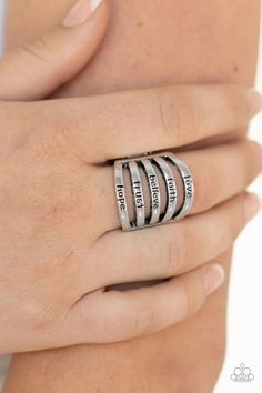 Stamped in the words, "love", "faith", "believe", "trust", and "hope", shimmery silver bands layer across the finger for a motivational look. Features a stretchy band for a flexible fit. Sold as one individual ring. Lead and Nickel Free. Silver Bands, Hope Gifts, Words Love, Losing Faith, Paparazzi Accessories, Affordable Jewelry, Paparazzi Jewelry, Boutique Jewelry