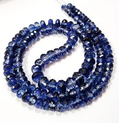 "AAAA+ Quality-Blue Sapphire Faceted Rondelle Beads Genuine Sapphire Gemstone Beads Large Rondelle Beads Full Sparkling Blue Sapphire Jewelry Item Code :   7148 Origin-:   Blue Sapphire Srilanka Grade-:  AAA Luster Sapphire  Stone shape-: Faceted Rondelle Beads Stone color-: Same As Picture  Metal           -: 925 Silver Clasp NOTE FOR BUYER:  I Will Make This Beautiful Necklace With Sterling Silver Clasp Length        -: 18 Inch Quantity-: 1 Strand Necklac Approx Weight   :  243.50 Carat   Approx Size        :   5 To 10 MM MOST BEAUTIFUL SAPPHIRE STRAND FOR JEWELRY MAKING AND GIFT FOR ANYONE. If you have any questions about this item please contact me I will get back to you as soon as ABOUT US skgemsstone based in Jaipur, India is a company engaged in supplier, manufacturing, wholesale an Blue Beaded Necklaces With Stones For Jewelry Making, Blue Rondelle Faceted Bead Necklace, Blue Rondelle Beaded Necklace With Faceted Beads, Blue Oval Gemstone Beads, Blue Rondelle Faceted Bead Necklaces, Blue Faceted Oval Beads, Blue Rondelle Beads, Blue Rondelle Beaded Necklace With Spacer Beads, Blue Rondelle Beads For Jewelry Making