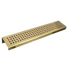 a gold metal grate with holes on the bottom and sides, for use as a shelf