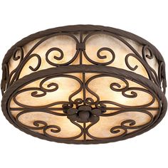 a light fixture with an intricate design on it