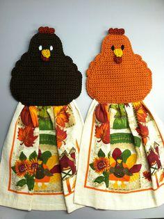 two crocheted chickens sitting next to each other