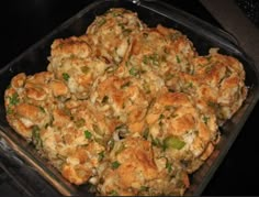 a casserole dish with meat and vegetables in it